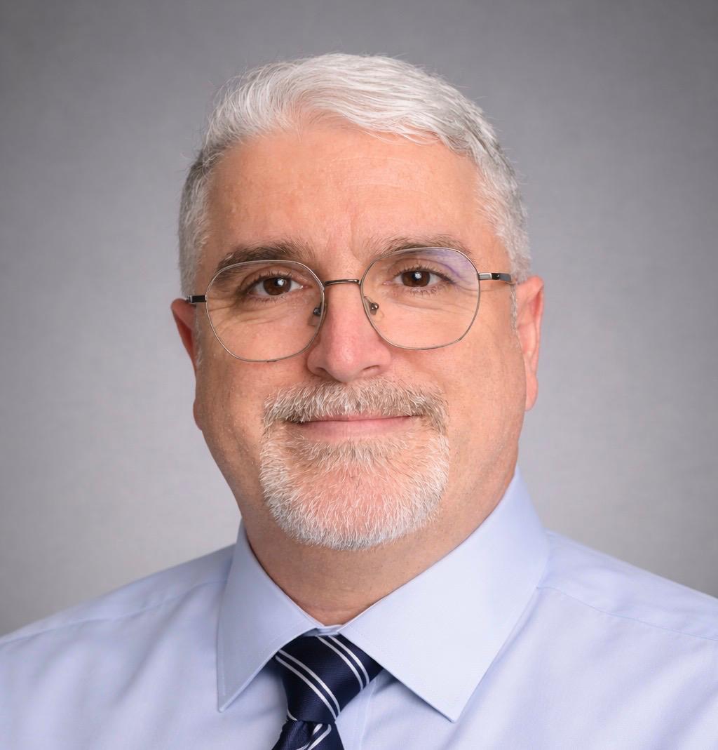 Cellular health and root-cause medicine expert Dr. Server Bozdogan, MD PhD, portrait